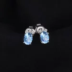 JewelryPalace Crown 1ct Oval Natural Sky Blue Topaz 925 Sterling Silver Stud Earrings for Woman Gemstone Jewelry Birthday Gift