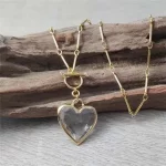 FUWO 1Pc Handcrafted Natural Clear Quartz Necklace,Golden OT Buckle Chain Heart-Shaped Semi-Precious Stone Women's Gift NC475-1